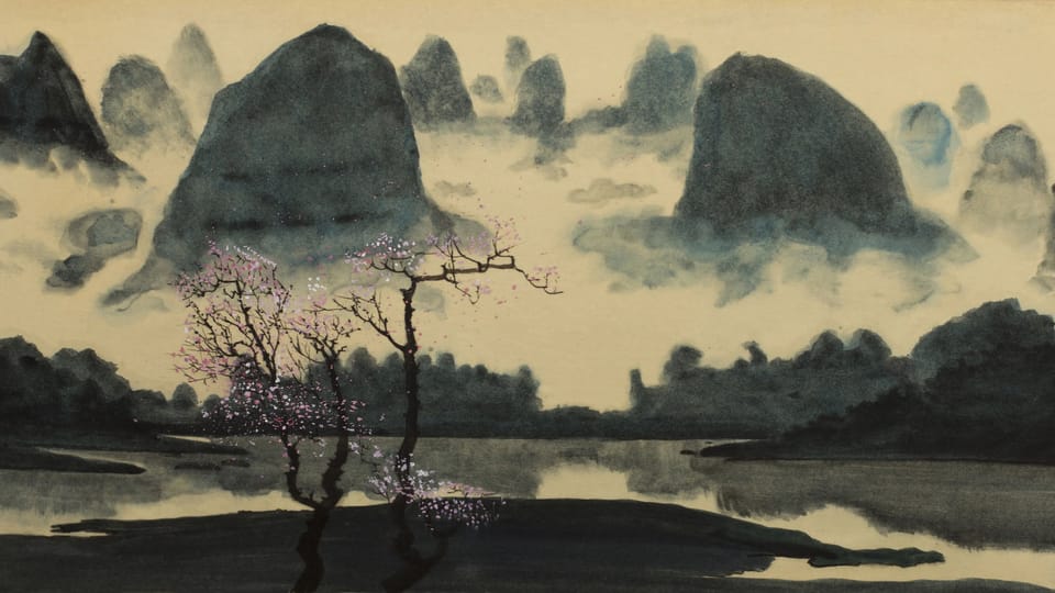A blooming cherry tree in abstract background.